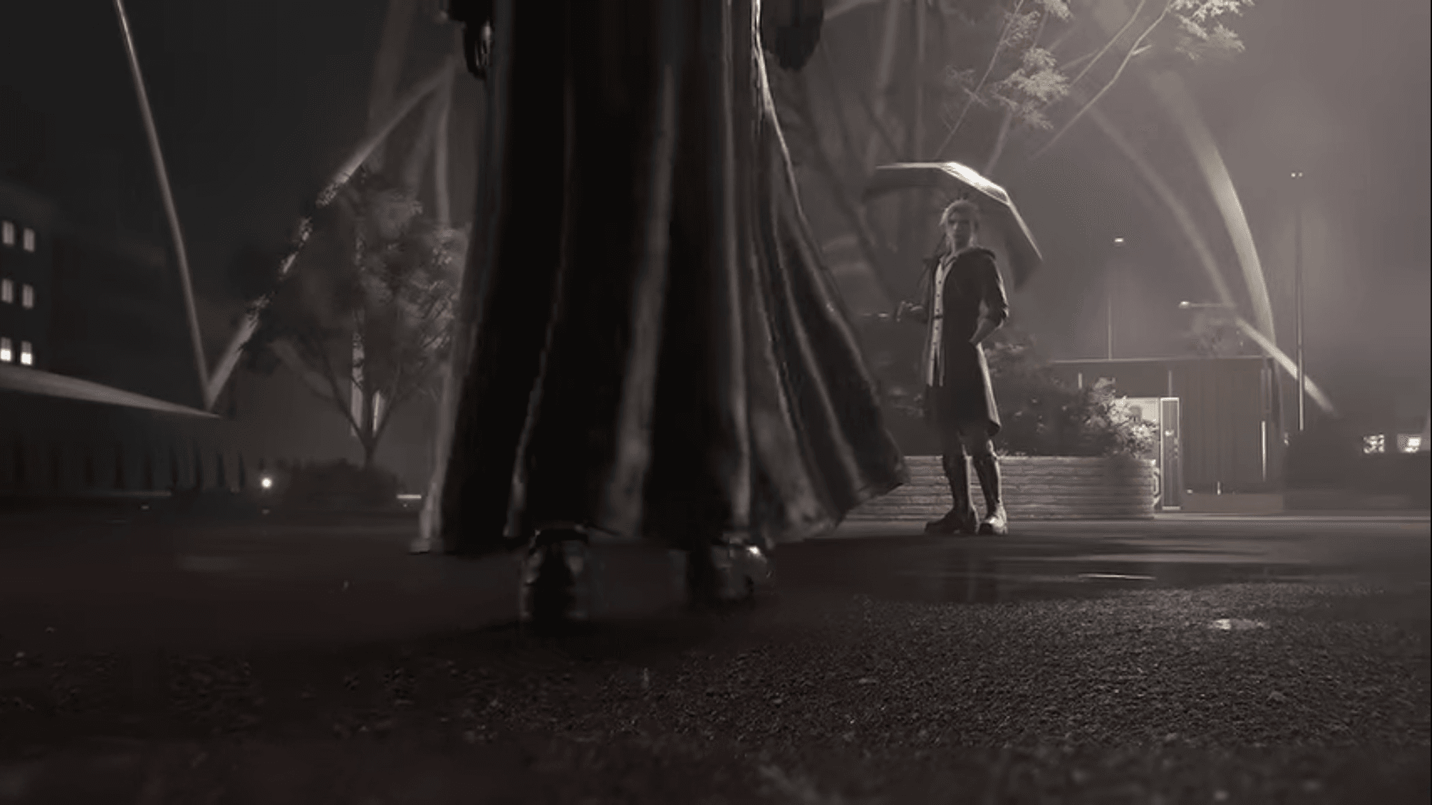 Another screencap from the D23 KHIV trailer showing the same individual being approached by a hooded figure.